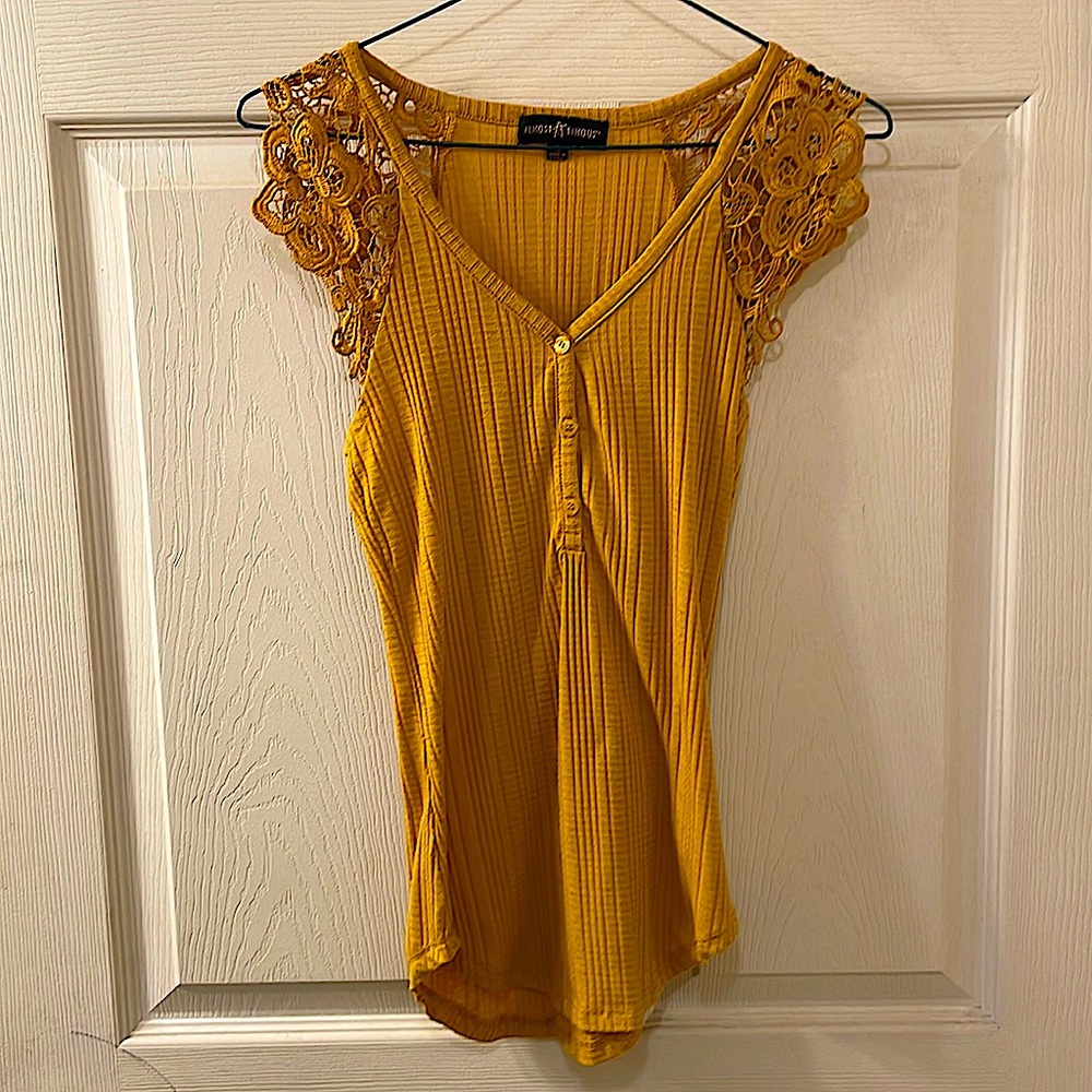 yellow blouse with lacy sleeves